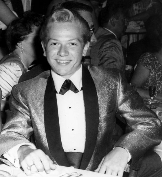 Feeling sophisticated in my gold lamé tuxedo jacket at a grad night event in 1958, a few days after my 15th birthday.